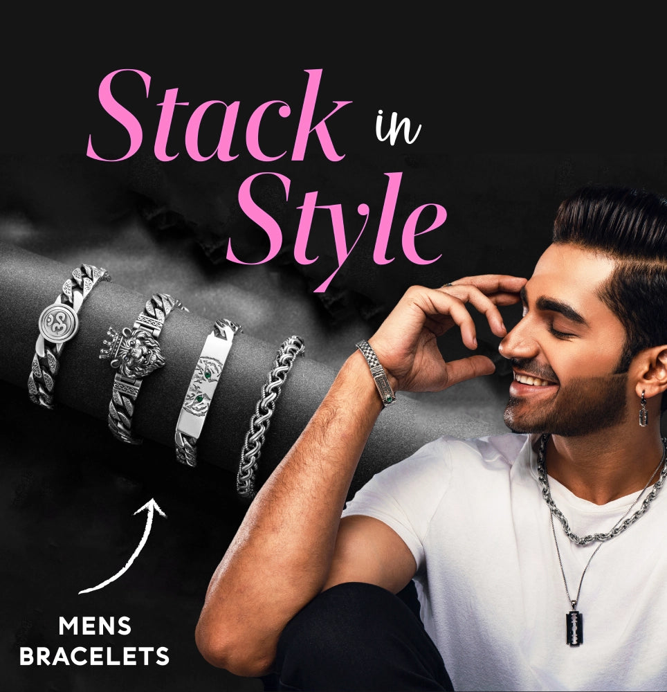 Stacked and layered men's bracelets for a stylish, modern look.