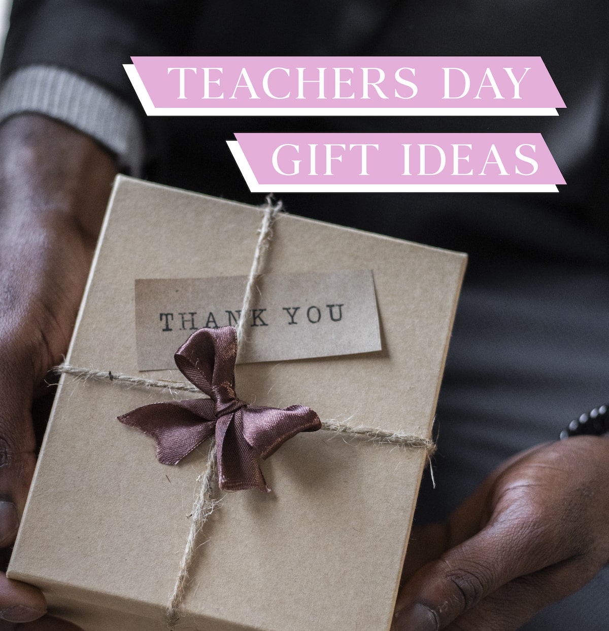 A handcrafted gift box with aThank You" note, tied with a satin ribbon, perfect for Teachers Day gift ideas featuring unique imitation jewelry.