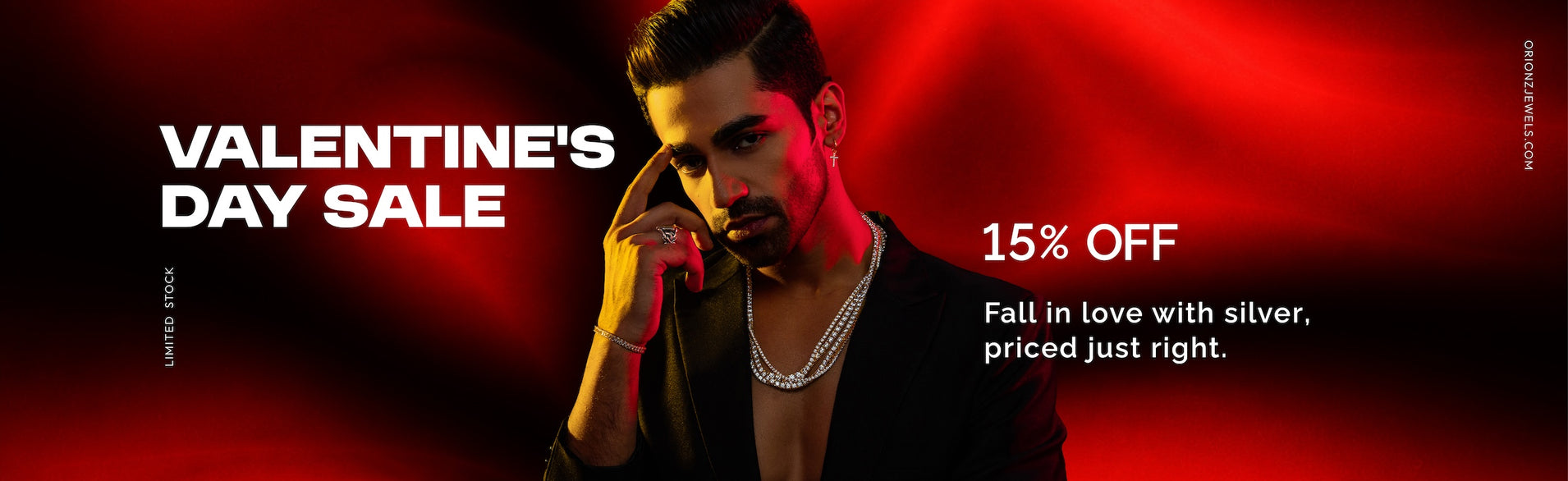 Promotional banner for Valentine's Day sale with a person holding a phone, red background, and text about silver jewelry.