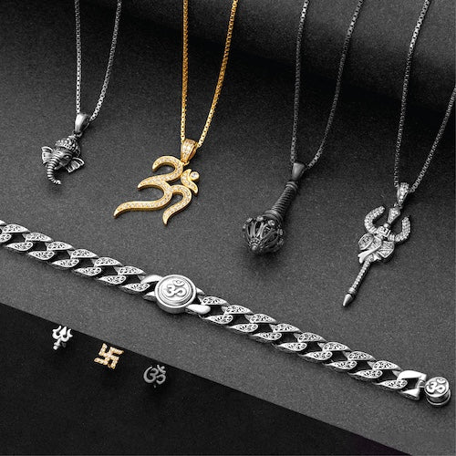 Collection of various necklaces and a bracelet on a dark surface