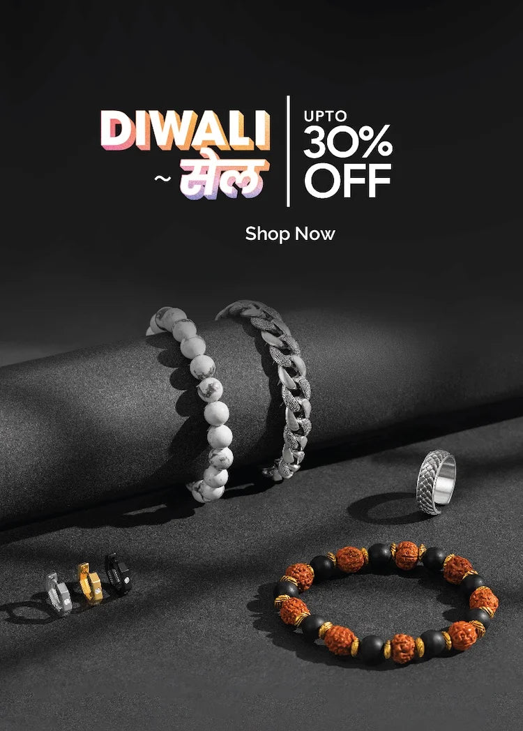 Bracelets and rings on a dark surface with Diwali sale text.