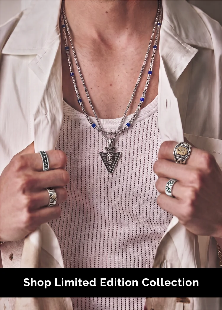 A close-up lifestyle shot of a person wearing layered silver necklaces, including a central triangular pendant, along with silver rings, all styled with a white ribbed tank top and an open white shirt. A black banner at the bottom reads 'Shop Limited Edition Collection'.