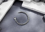 The Modern Monk Oxidised Silver Swastik Bracelet For Men By Orionz Jewels