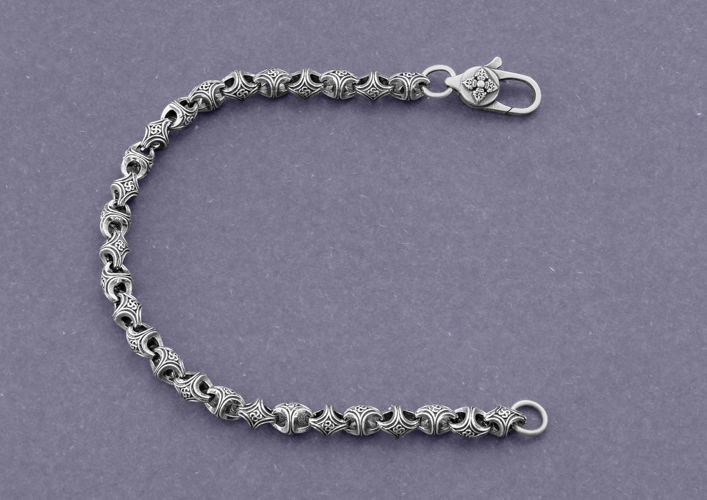 The Modern Monk Oxidised Silver Swastik Bracelet For Men By Orionz Jewels