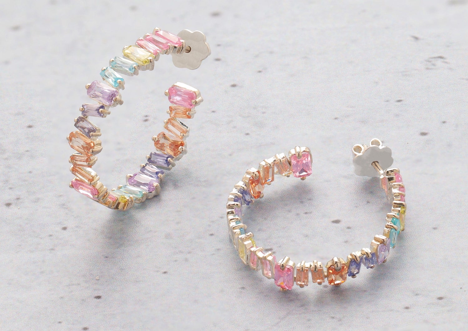 Asymmetrical outlet hoop earrings